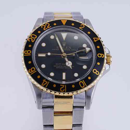 Rolex GMT Master 18K Yellow Gold Steel Black Dial 40mm Circa