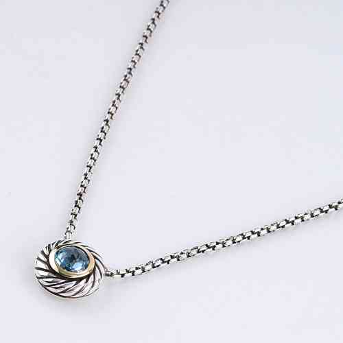 Movado Sterling Silver 18K Gold Blue on sale Topaz Pendant