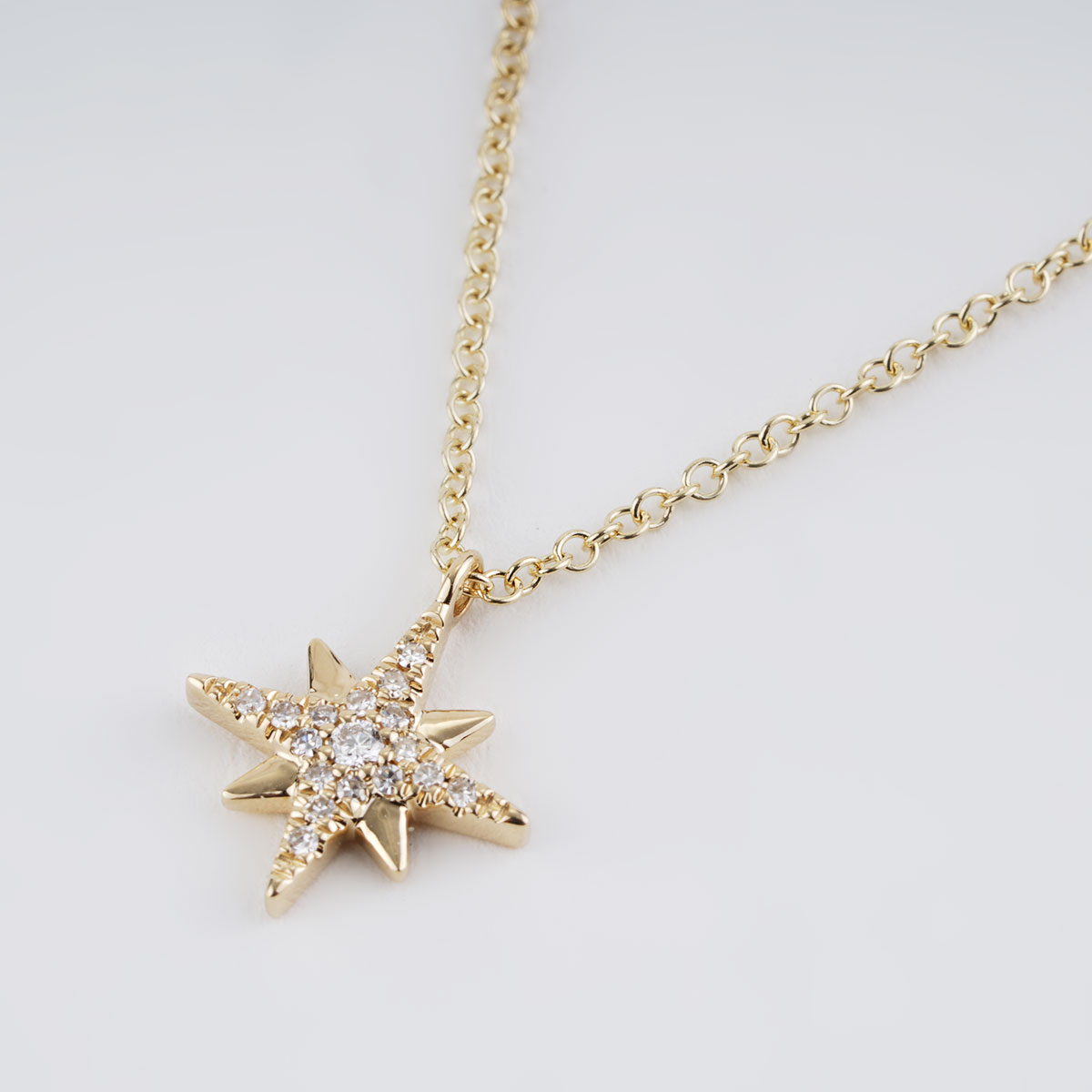 06 CTTW Diamond Petite North Star Pendant in Yellow Gold