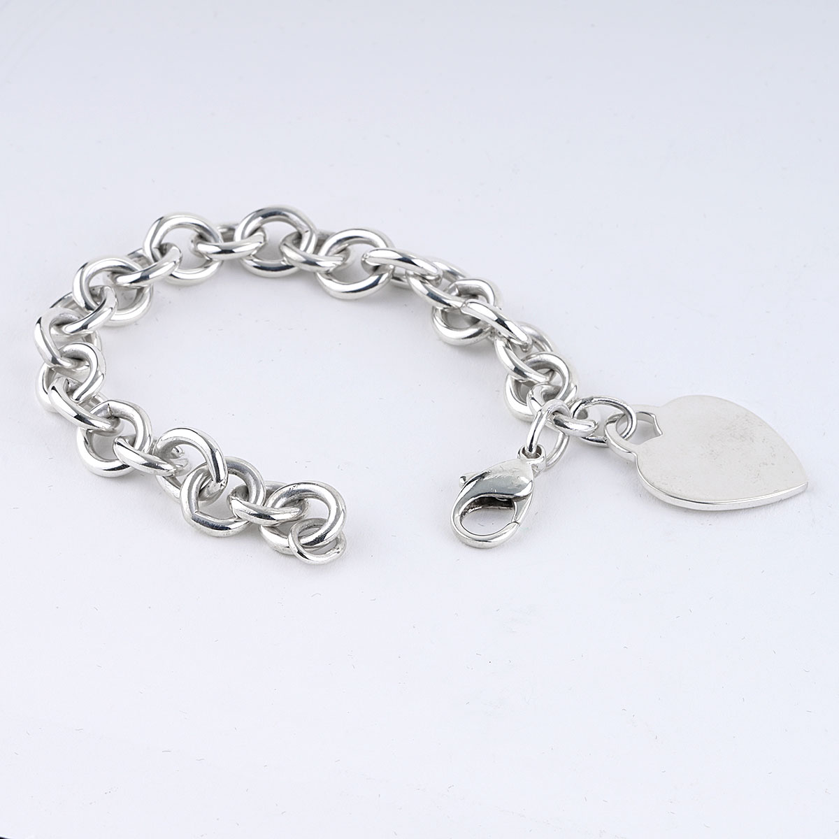 Amazon.com: Sterling Silver Dangling Heart Charm Bracelet: Link Charm  Bracelets: Clothing, Shoes & Jewelry