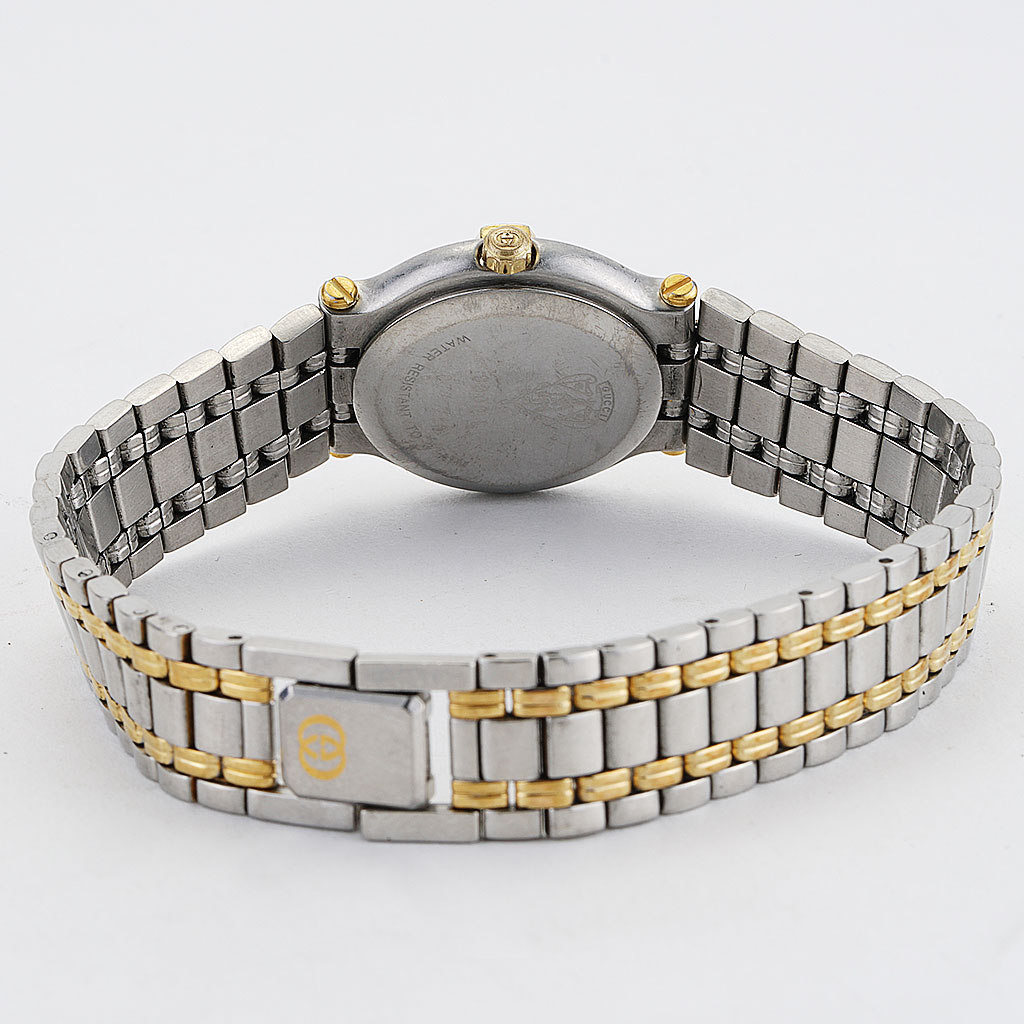 gucci women's watch silver and gold