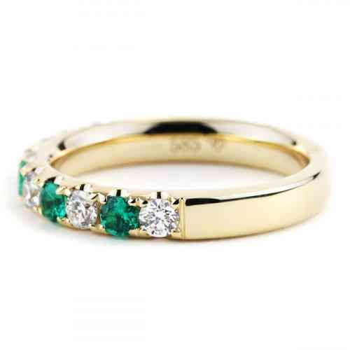 0.74 CTTW Alternating Round Emerald and Diamond Band in