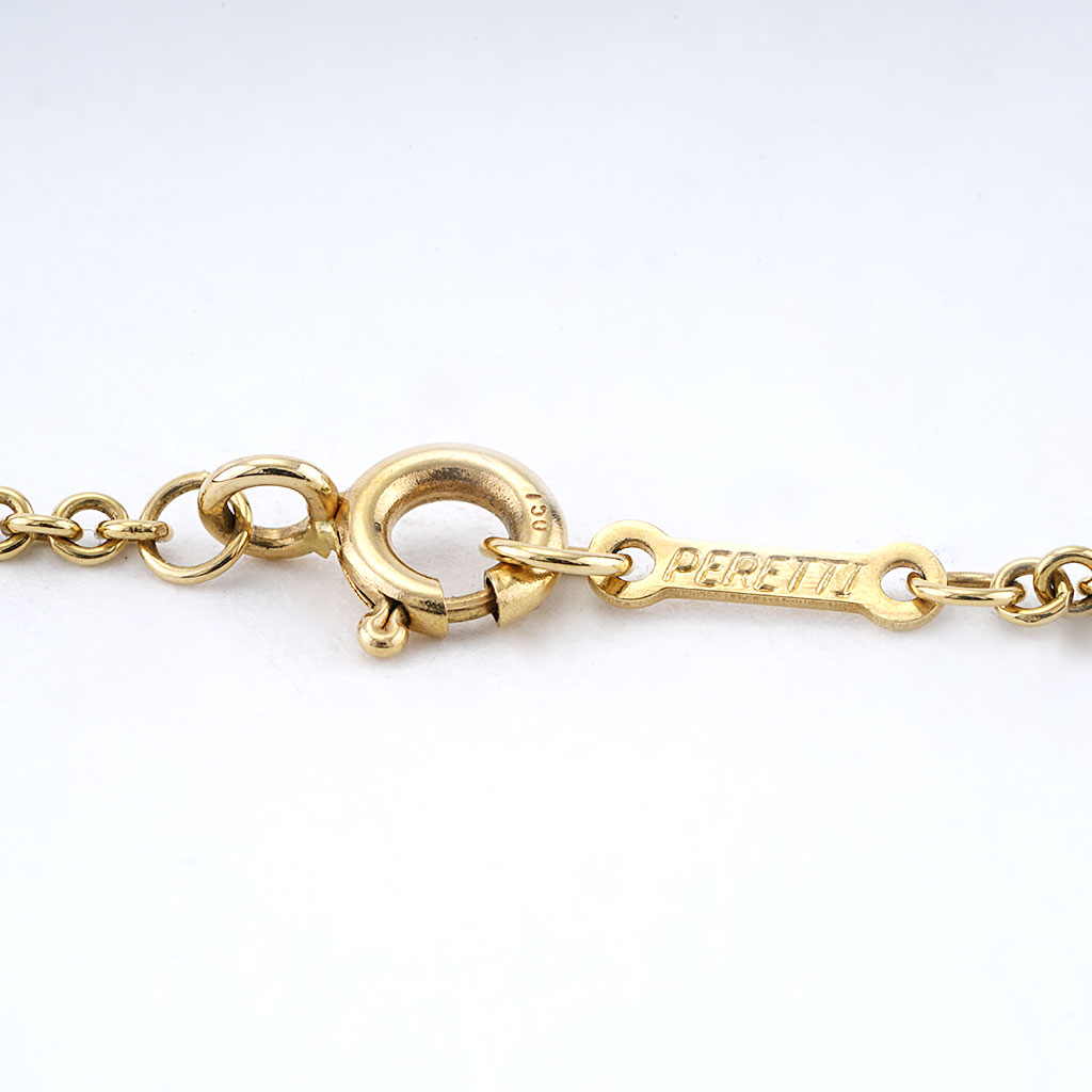 Tiffany & Co. Elsa Peretti Medium Infinity Cross Necklace in Yellow Gold
