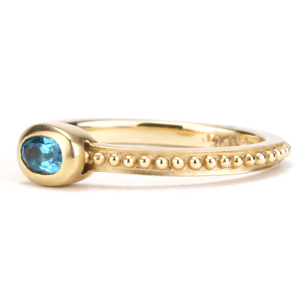 Stackable Oval Blue Topaz Ring with Bead Detail in Yellow Gold | New ...