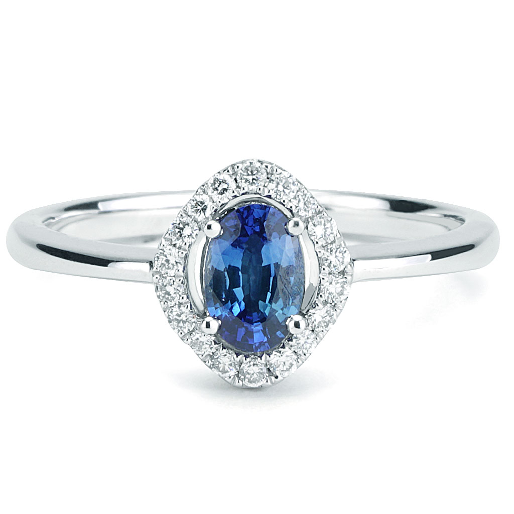 Oval Sapphire WIth Unique Diamond Halo Ring in White Gold | New York ...